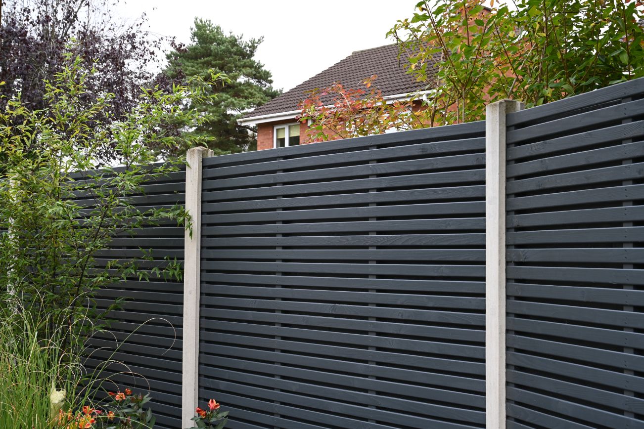 Fence painting team at work in London